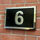 Modern house number sign in black