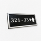 Cast aluminium directional sign with custom text and arrow for hotel or office wayfinding