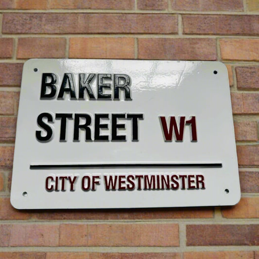 Street sign for Baker Street W1 in the City of Westminster on a white background