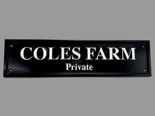 Black and white cast plaque