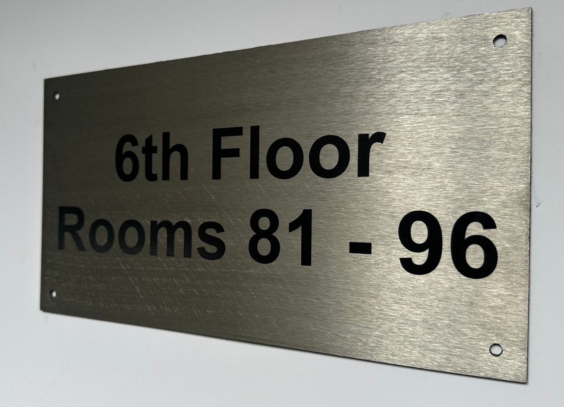 brushed steel sign