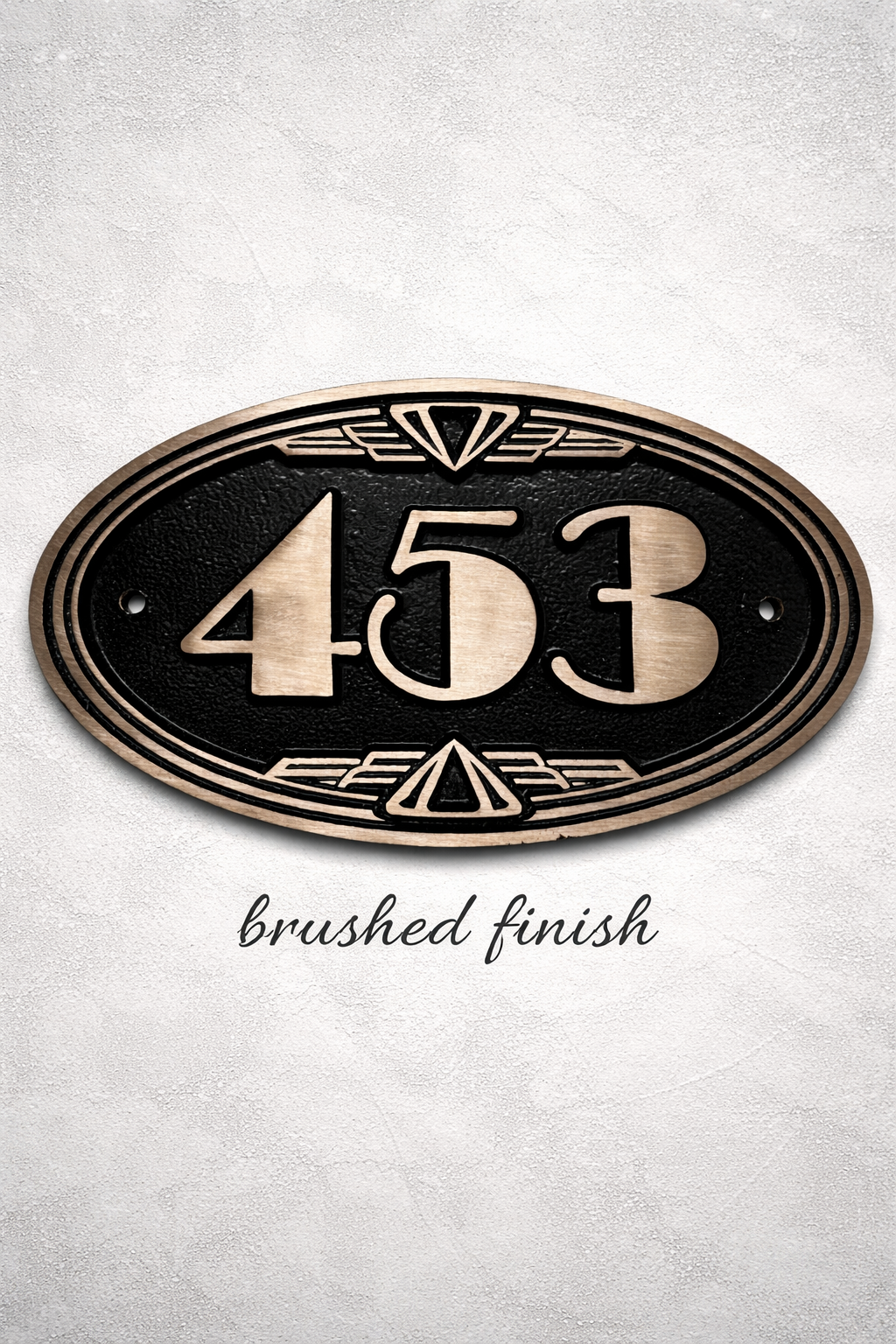 Oval bronze address plaque with raised numbers and decorative border