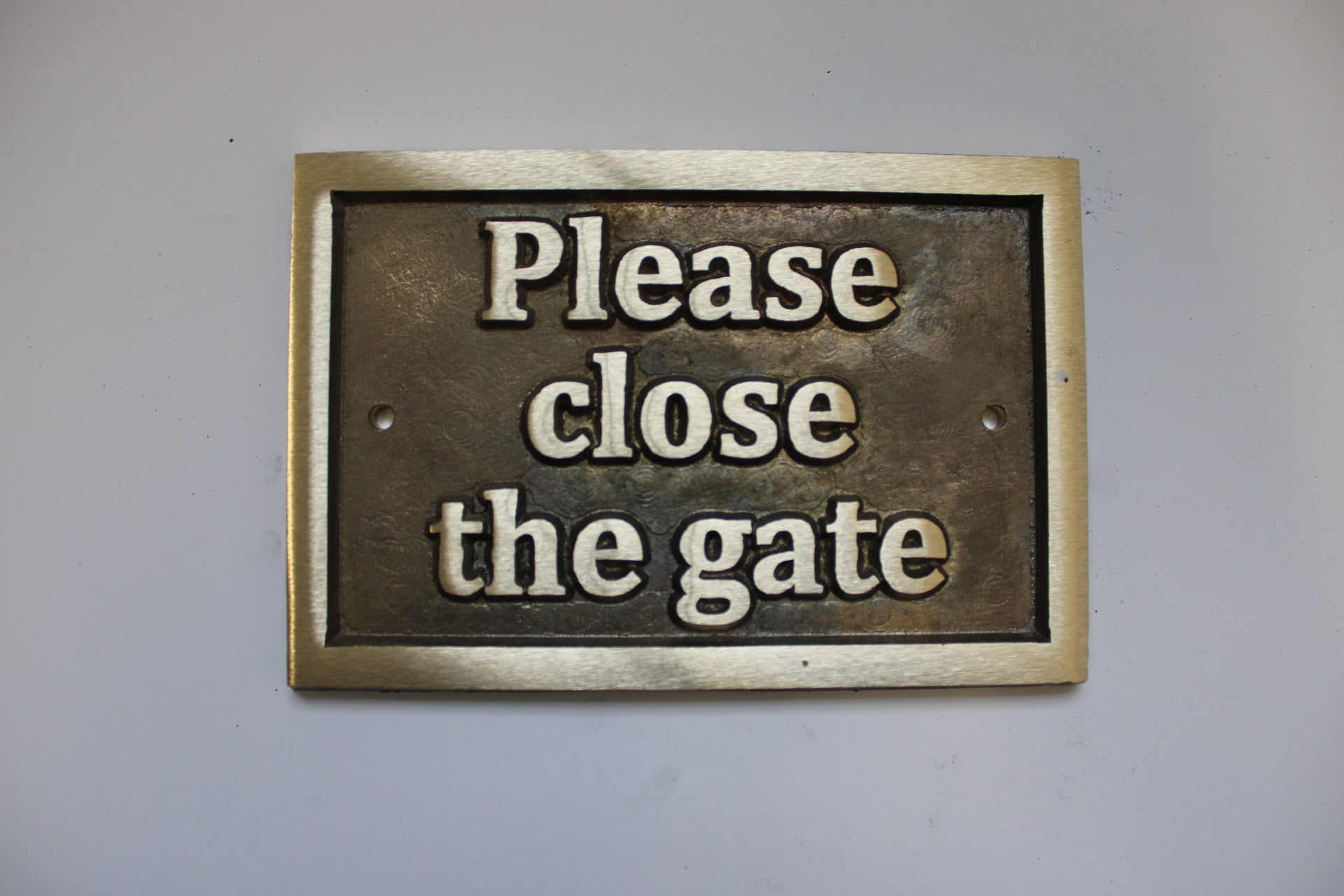 cast brass plaque sign