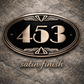 Luxury bronze hotel room number sign with geometric Art Deco detailing