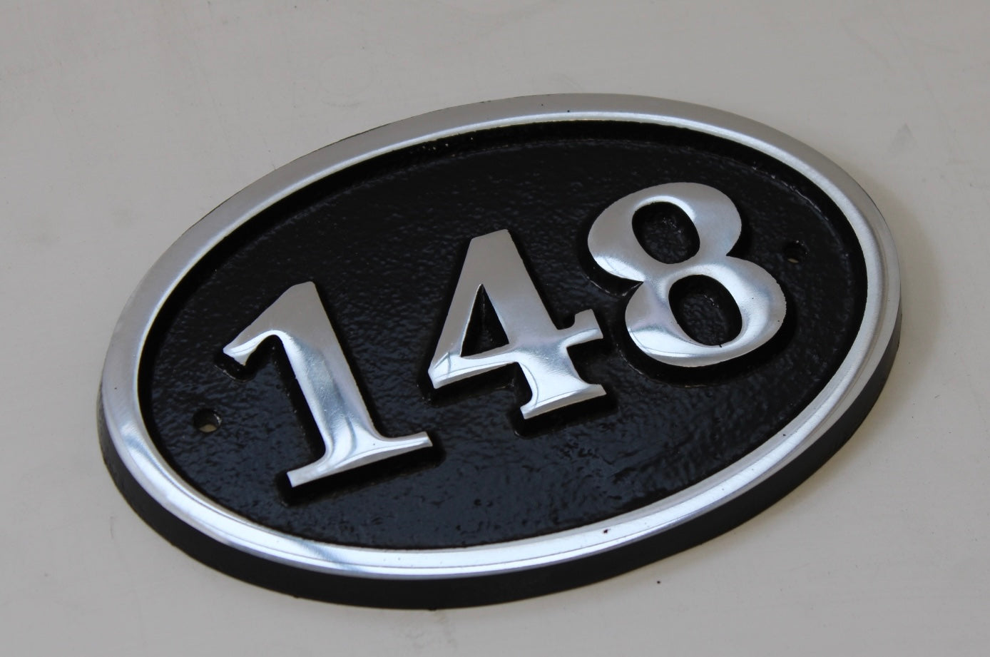 house number sign oval in black