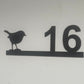 house number plate with robin