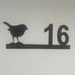 house number plate with robin