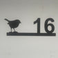 house number plate with robin