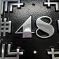 Art deco cast aluminium square house number sign