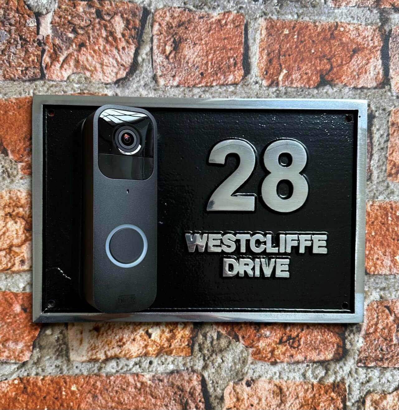 Modern address sign with smart doorbell