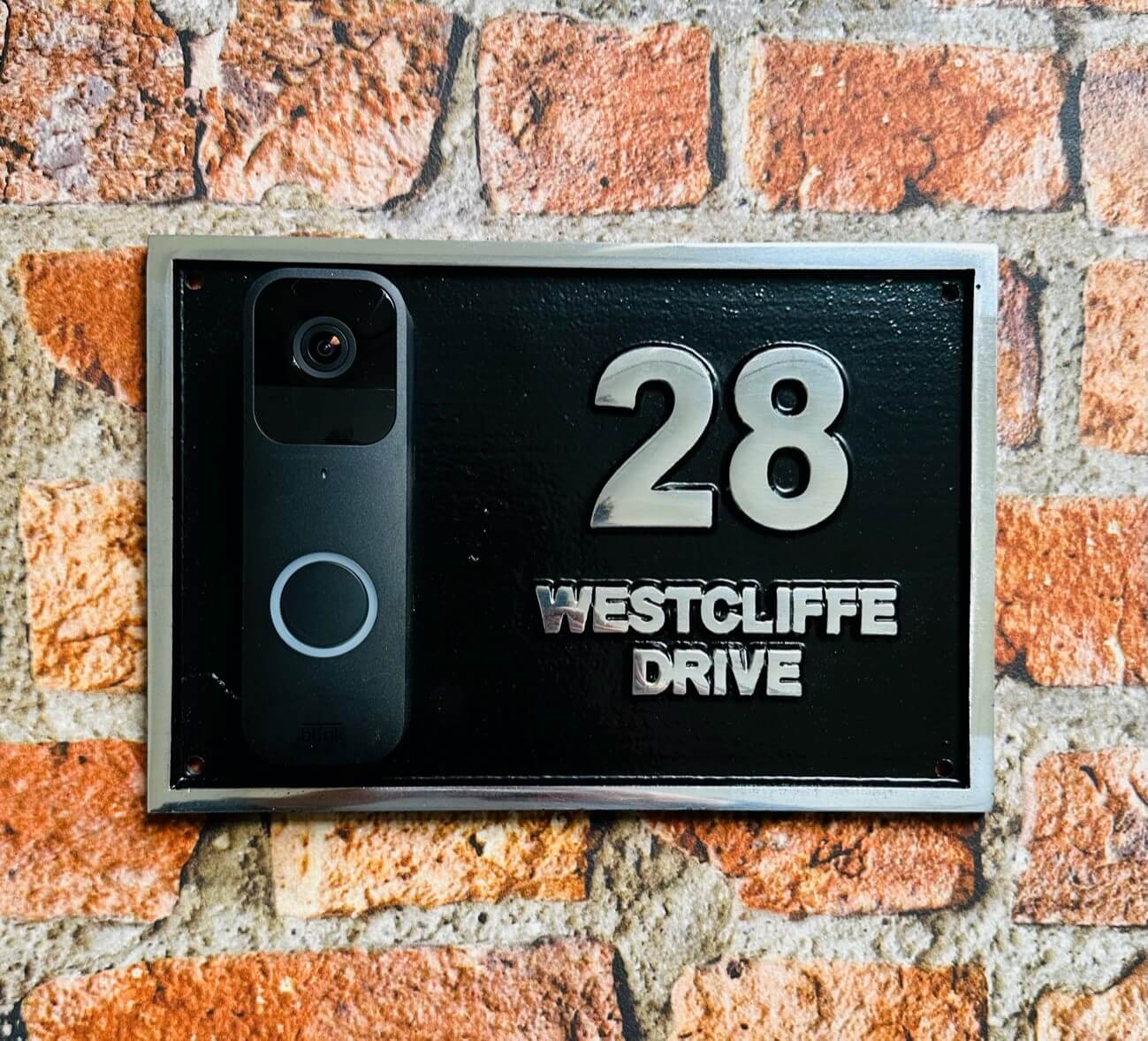 Modern address sign with smart doorbell