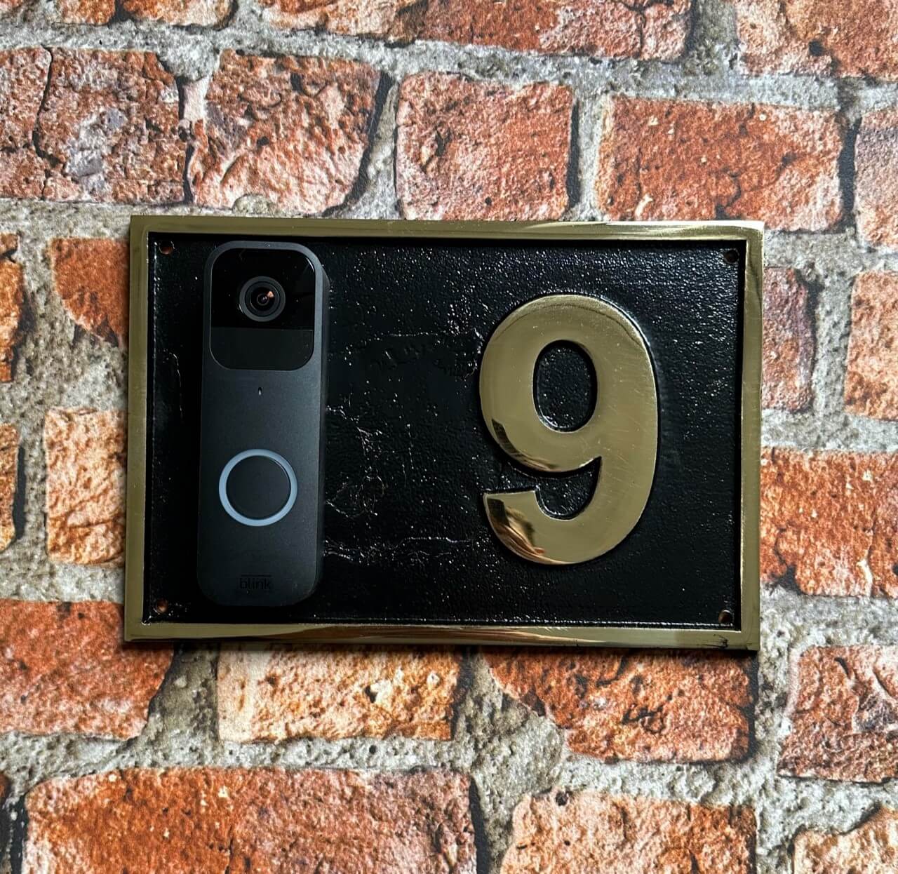 Modern address sign with smart doorbell