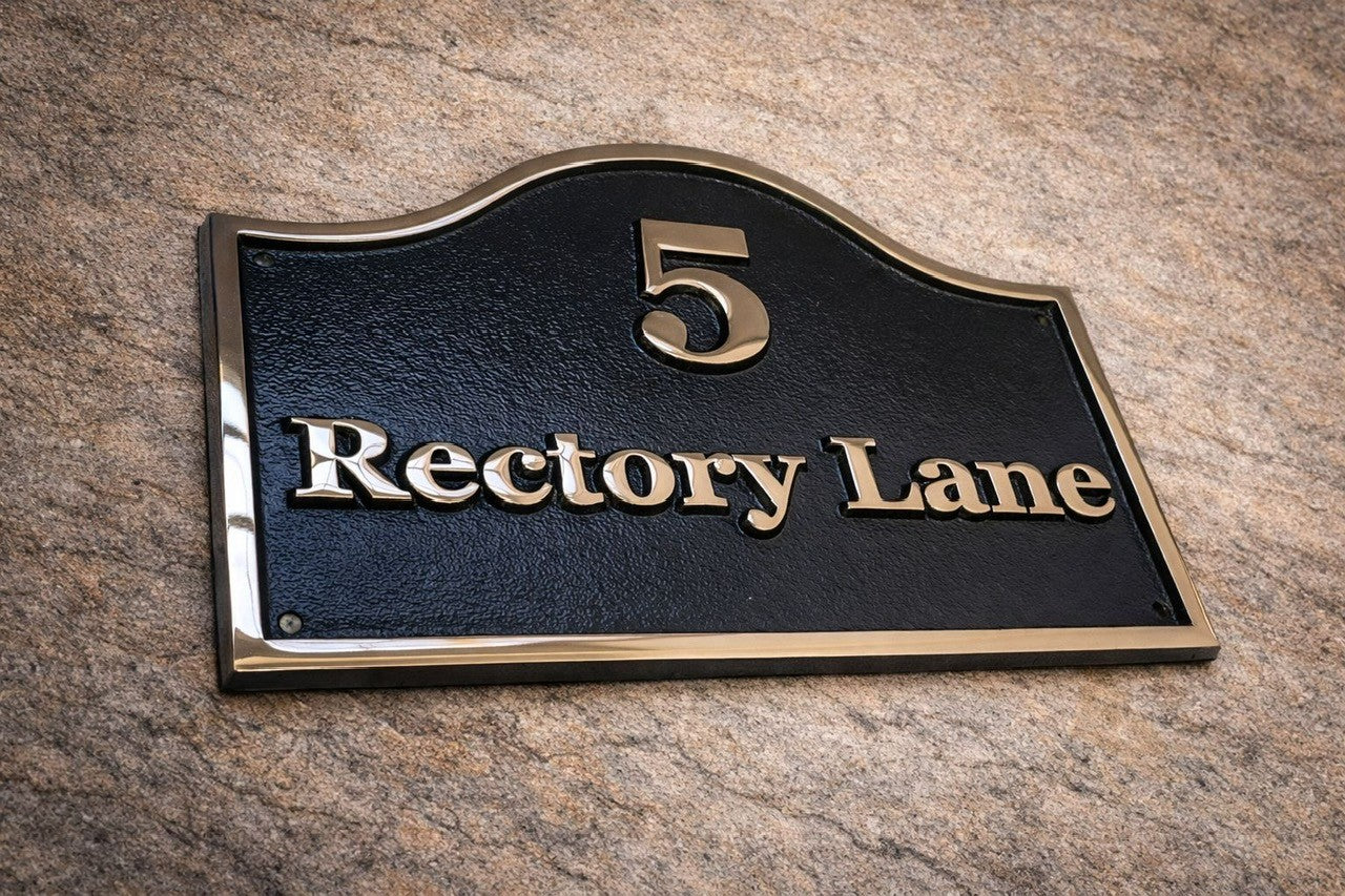 bronze oval top plaque