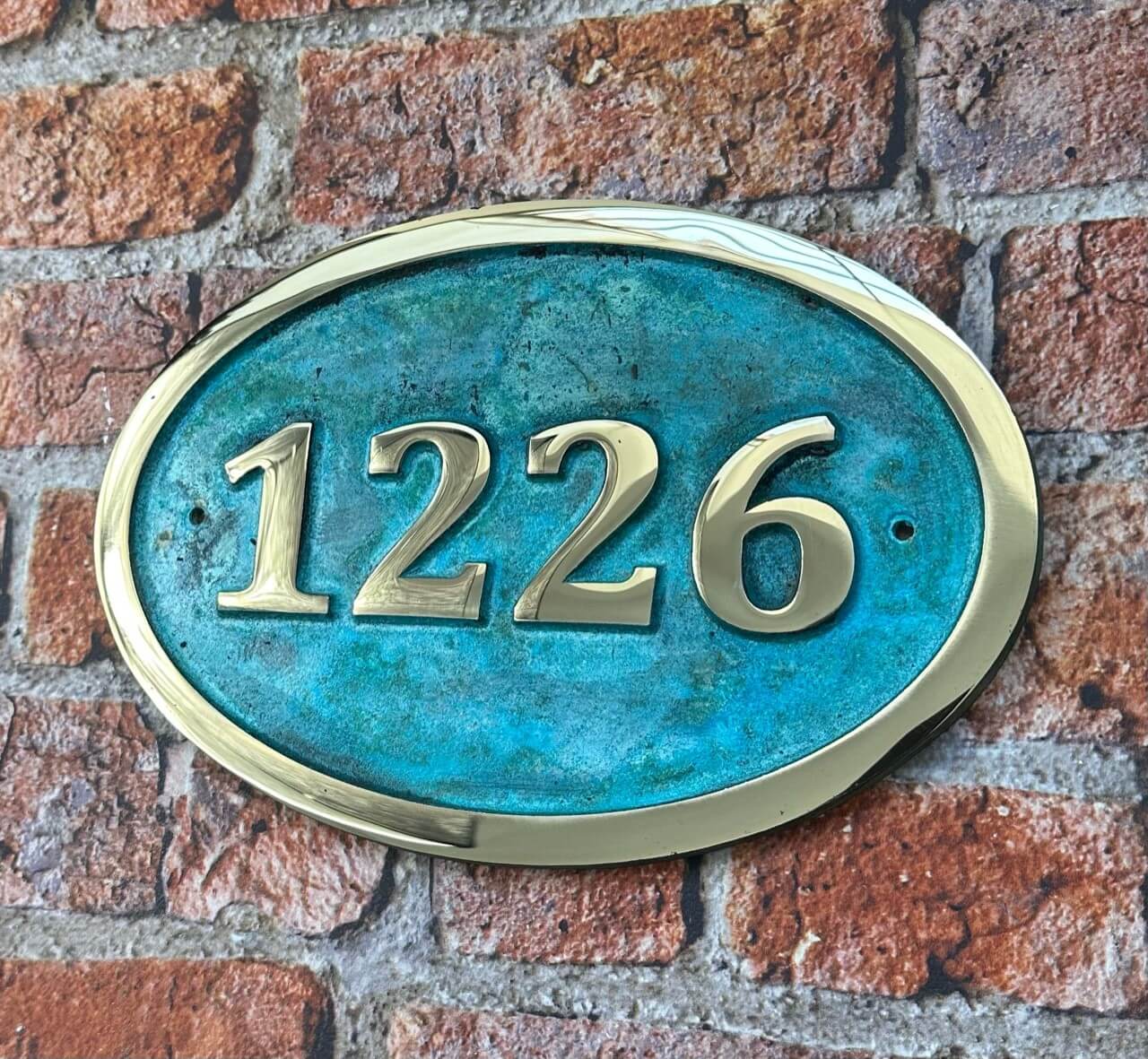 House number sign oval in bronze with Verdigris background