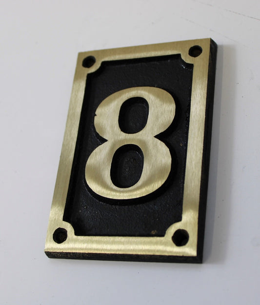 Number sign in bronze