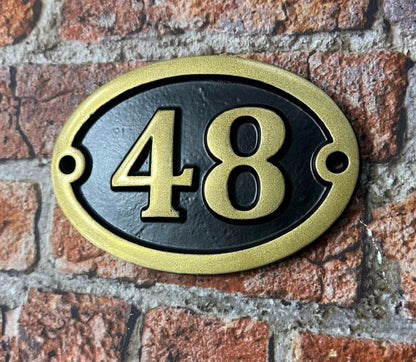 Aluminium number sign with gold painted number and text