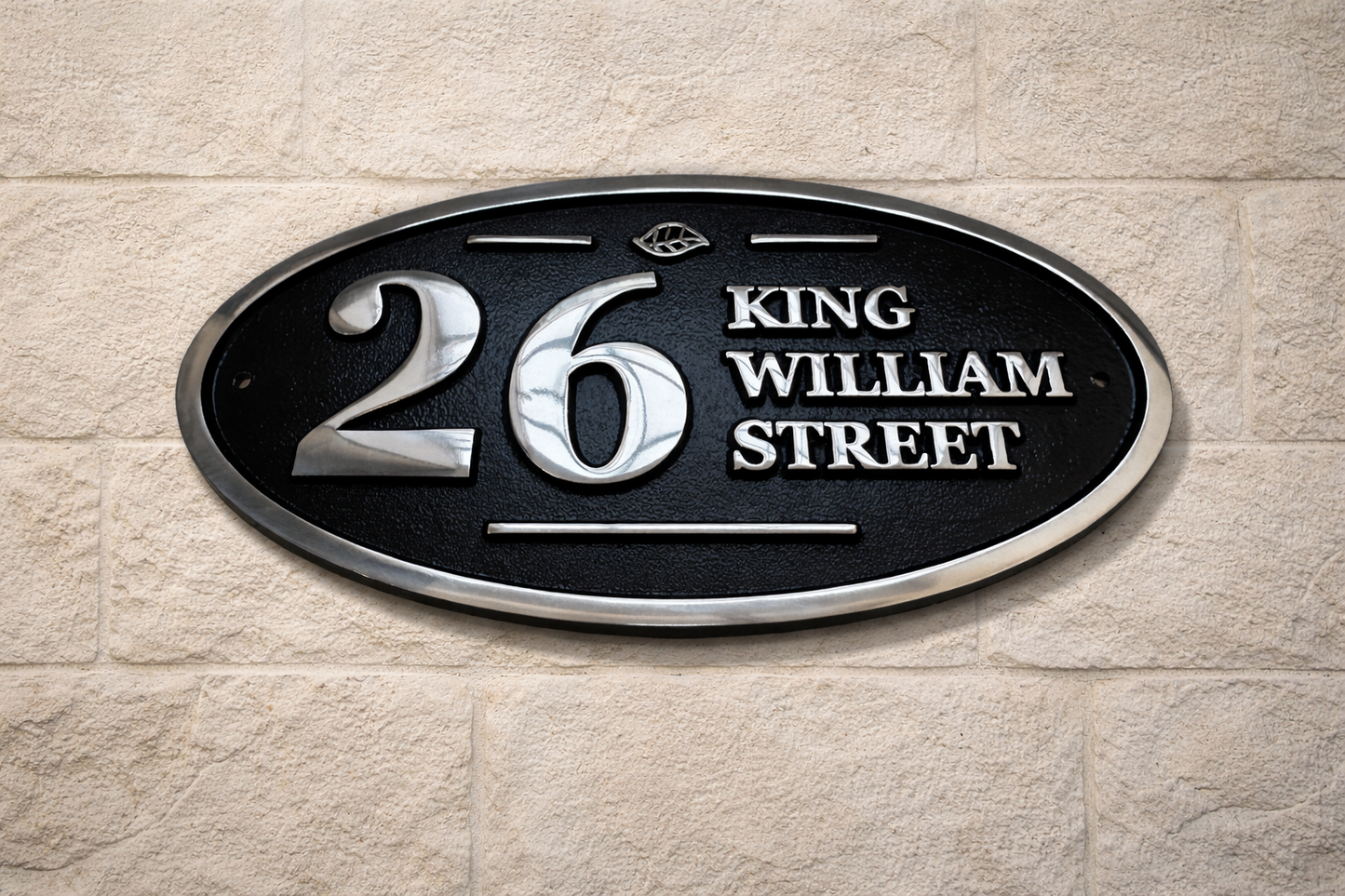 Wide oval aluminium house sign custom cast address plaque on wall