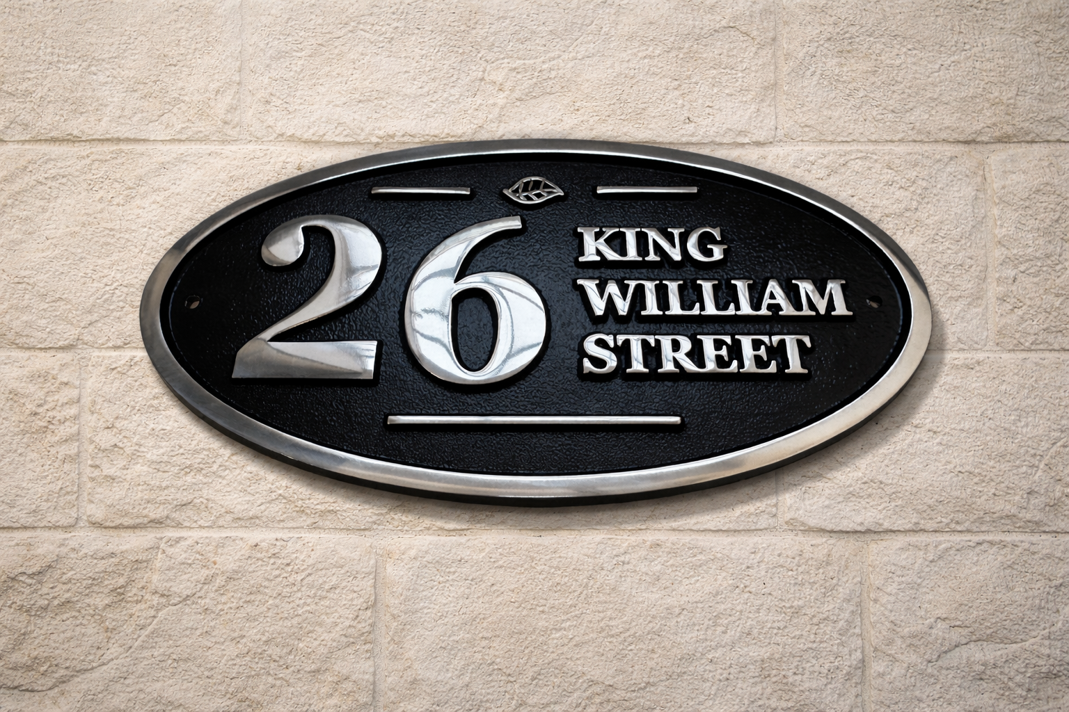 Wide oval aluminium house sign custom cast address plaque on wall