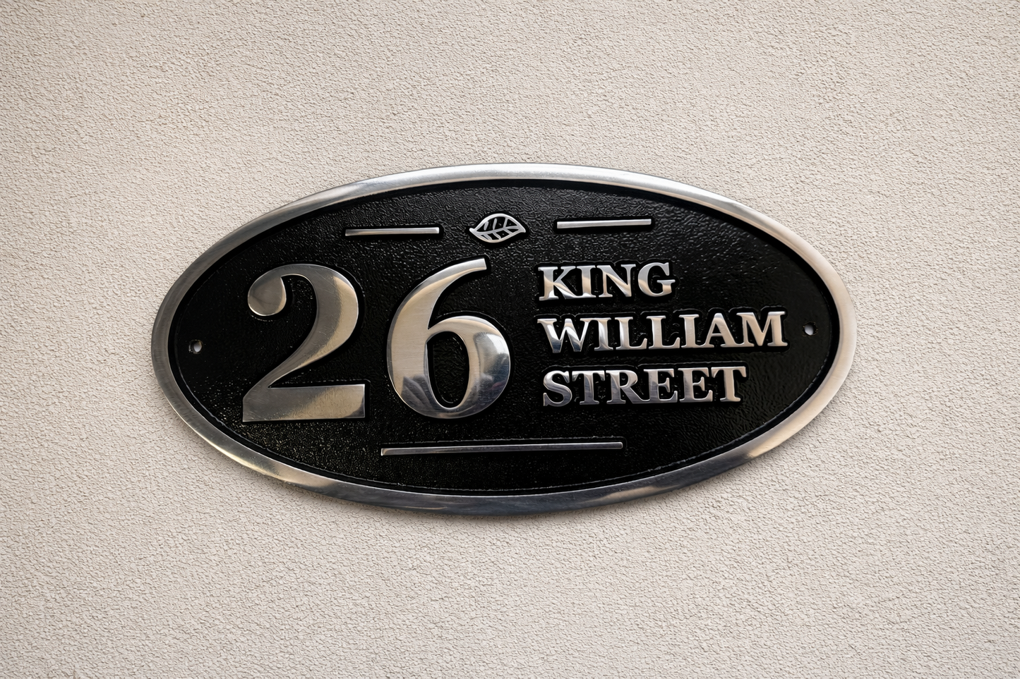 Wide oval aluminium house sign custom cast address plaque on wall