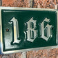 Numbered Door sign traditional in green