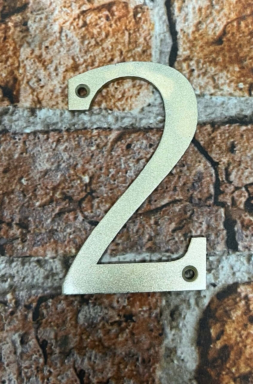 Door numbers in gold