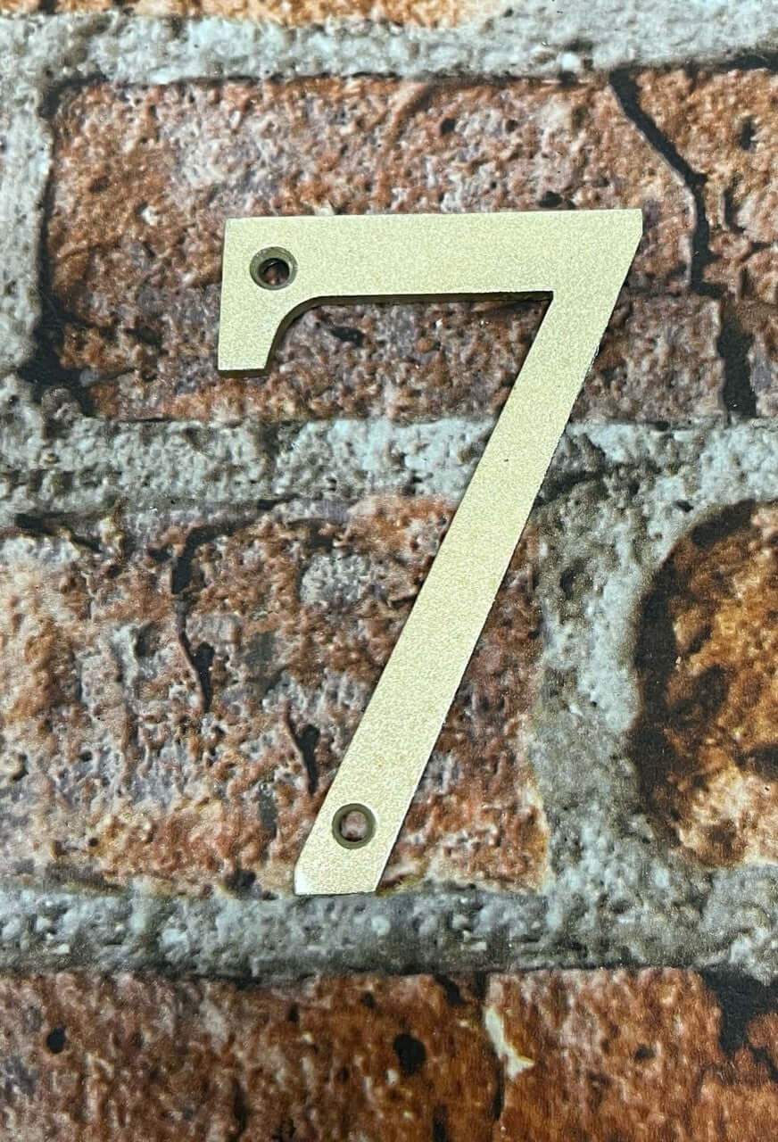 Door numbers in gold