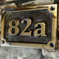 house number sign rectangle patina background
