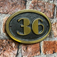house number sign art deco gunmetal background