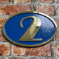 house number sign art deco blue background
