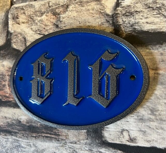 blue and gun metal house number sign