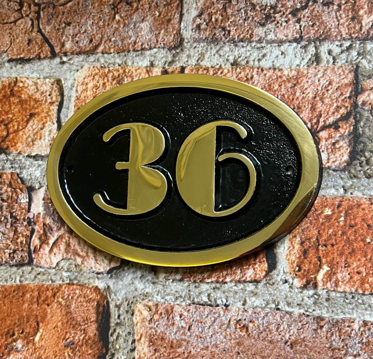 house number sign art deco black background
