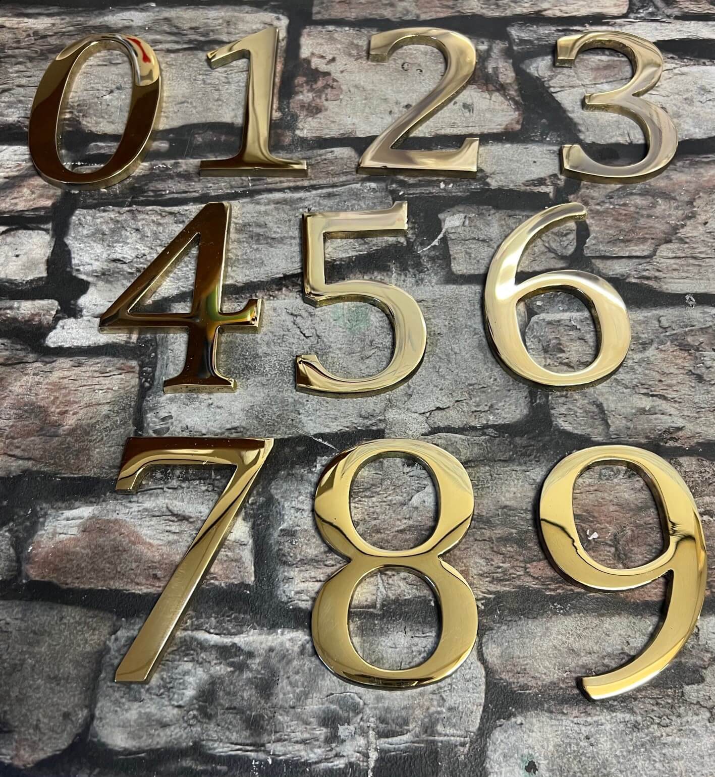 metal house numbers in brass