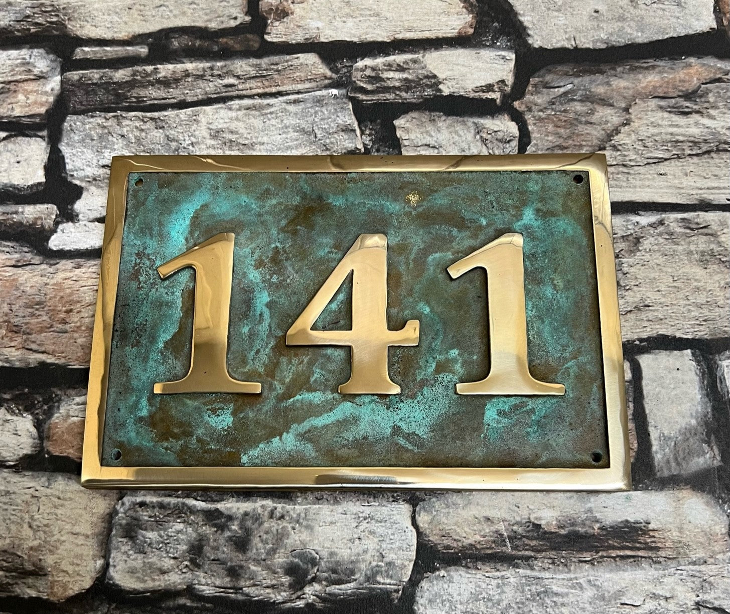 House number sign in bronze and Verdigris