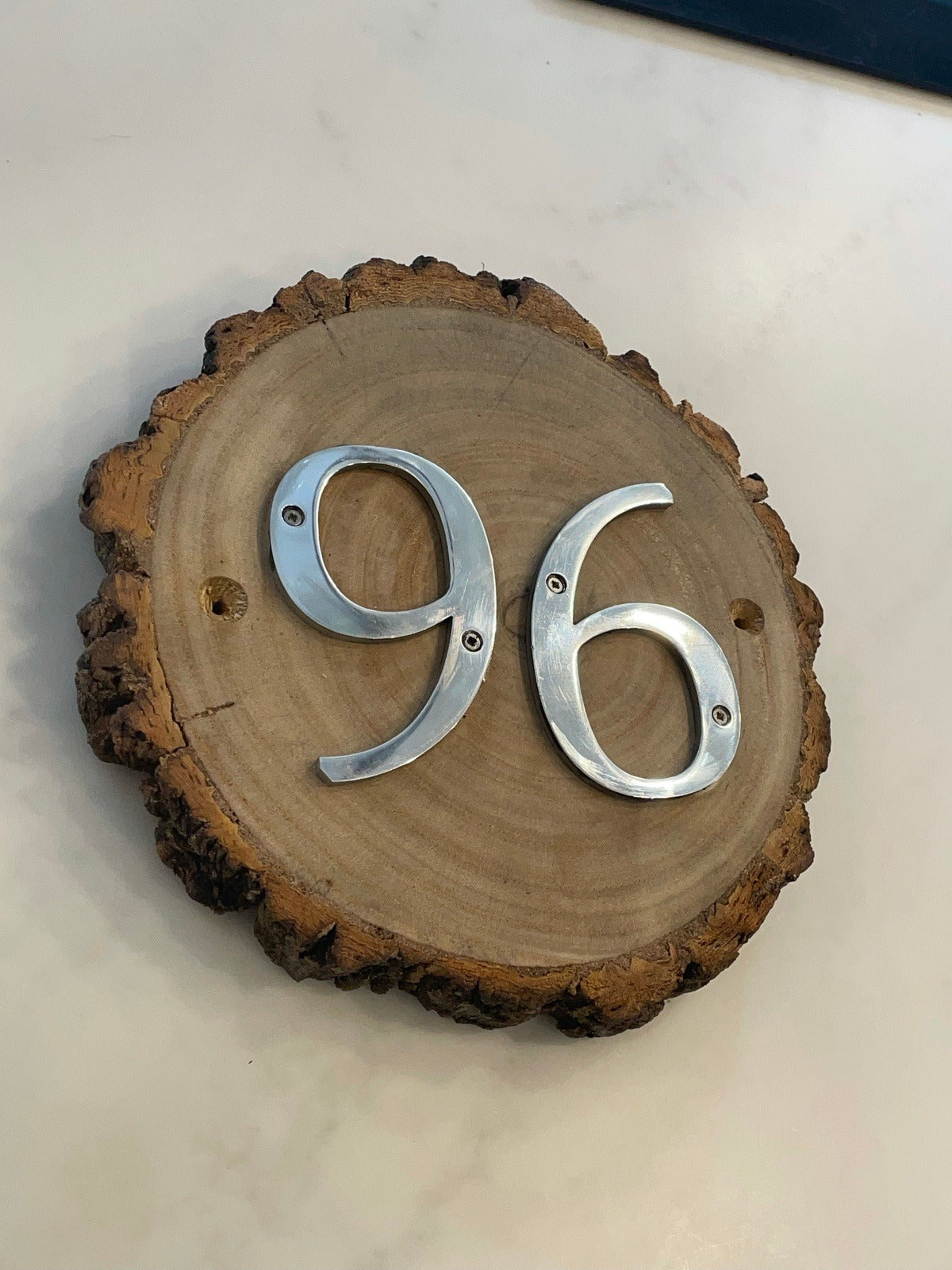 Metal House Numbers on Wood Log