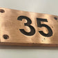 house number signs in copper