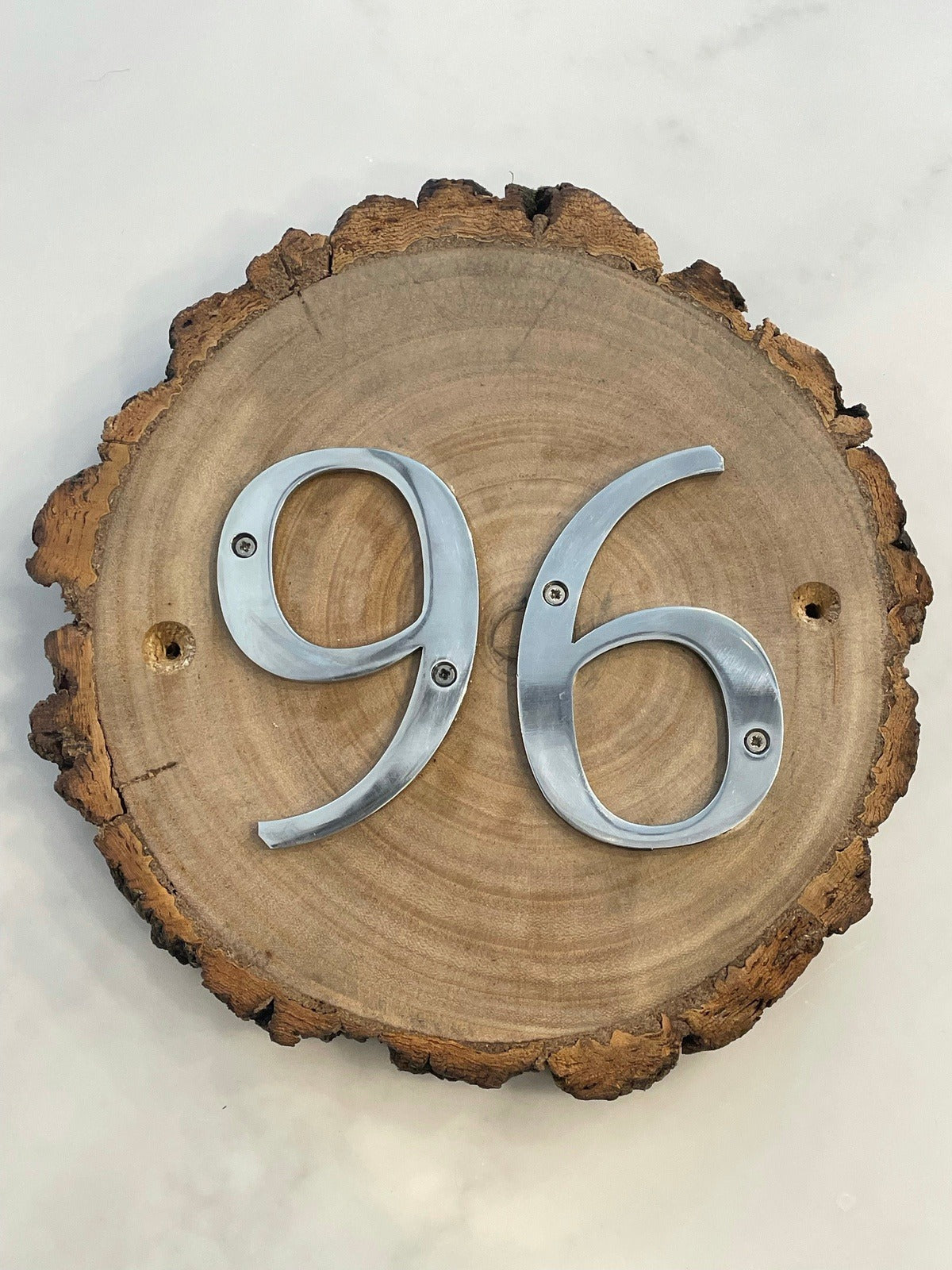 Metal House Numbers on Wood Log