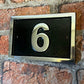 Modern door number sign in black